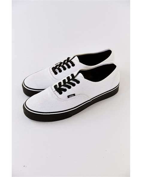 white shoes with black bottom.